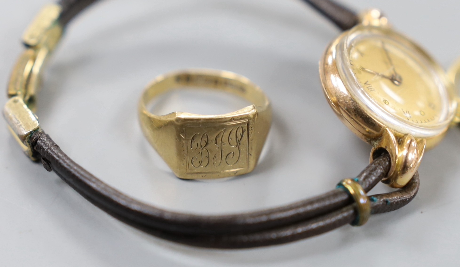 A lady's 9ct gold Accurist manual wind wrist watch, on a 9ct gold bracelet, gross weight 11.2 grams, one other lady's yellow metal wrist watch, three 9ct gold rings, a 9ct gold bracelet, a 9ct cross pendant on 9ct chain,